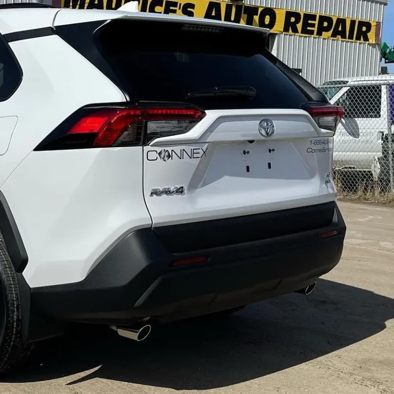 Tinted back window of a white Toyota SUV