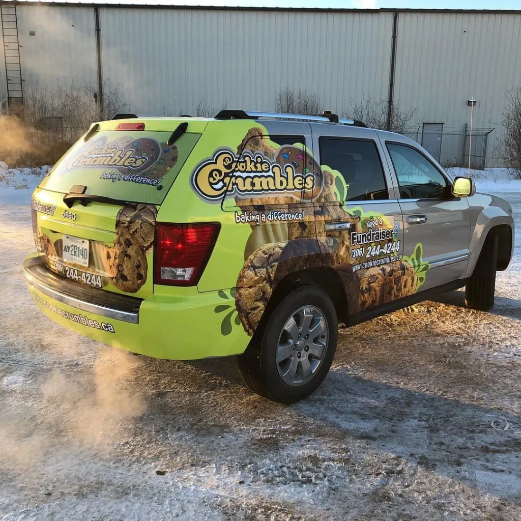 SUV warped with cookie company graphics.