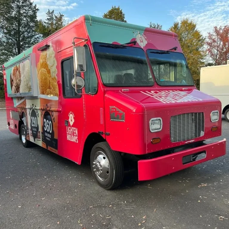 A food truck selling ice cream wrapped in custom graphics.