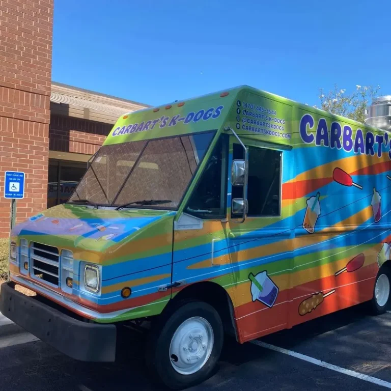 A food van warpped in colour vinyl graphics.