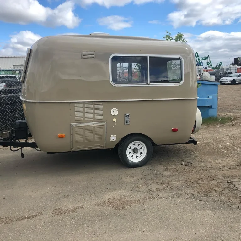 A trailer with glossy dark tan wrap.