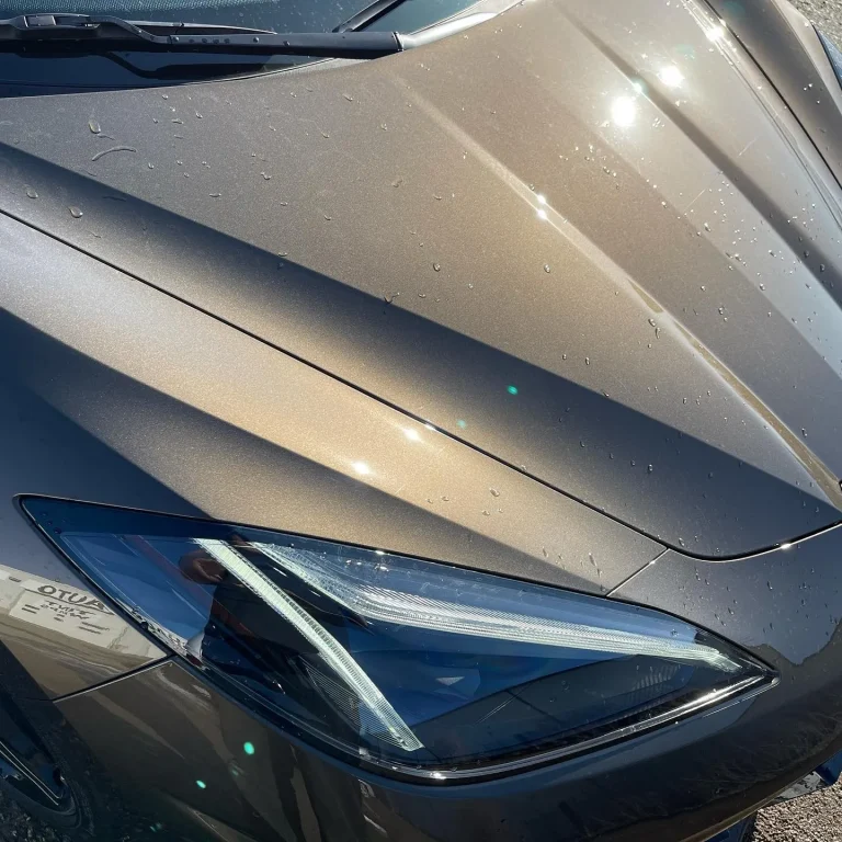 A car hood with glossy grey wrap.