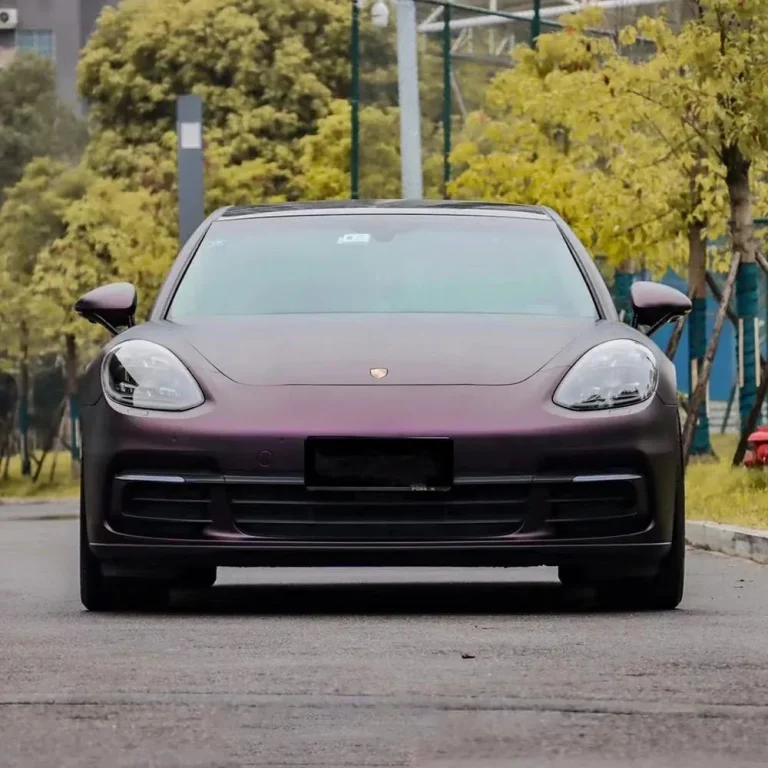 A Tesla wrapped in purple matte viny wrap.
