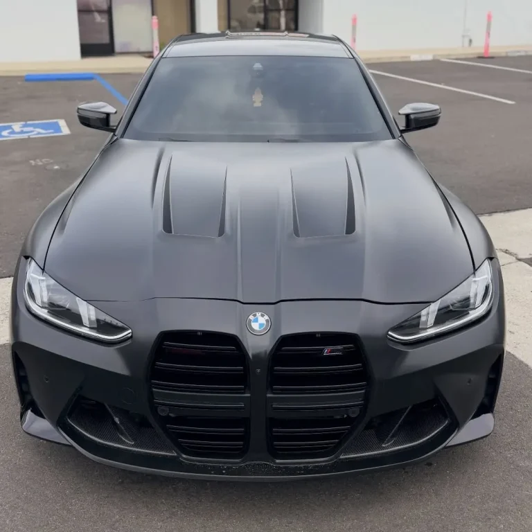 A BMW sportscan with satin black wrap.