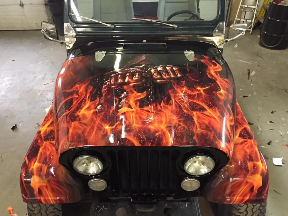 A jeep with graphic wrap.